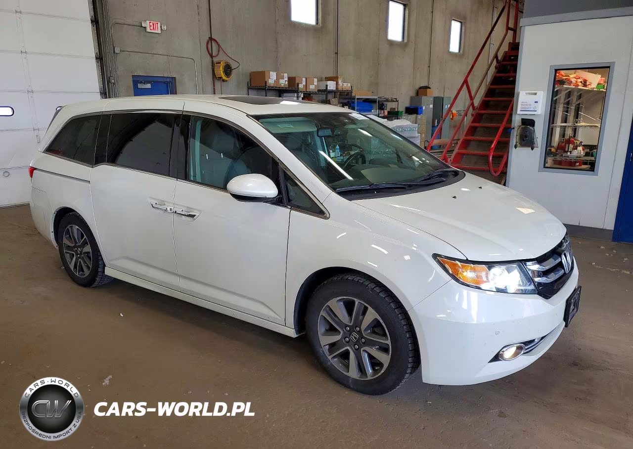 2017 Honda Odyssey Touring VIN:5FNRL5H91HB012394 - 4