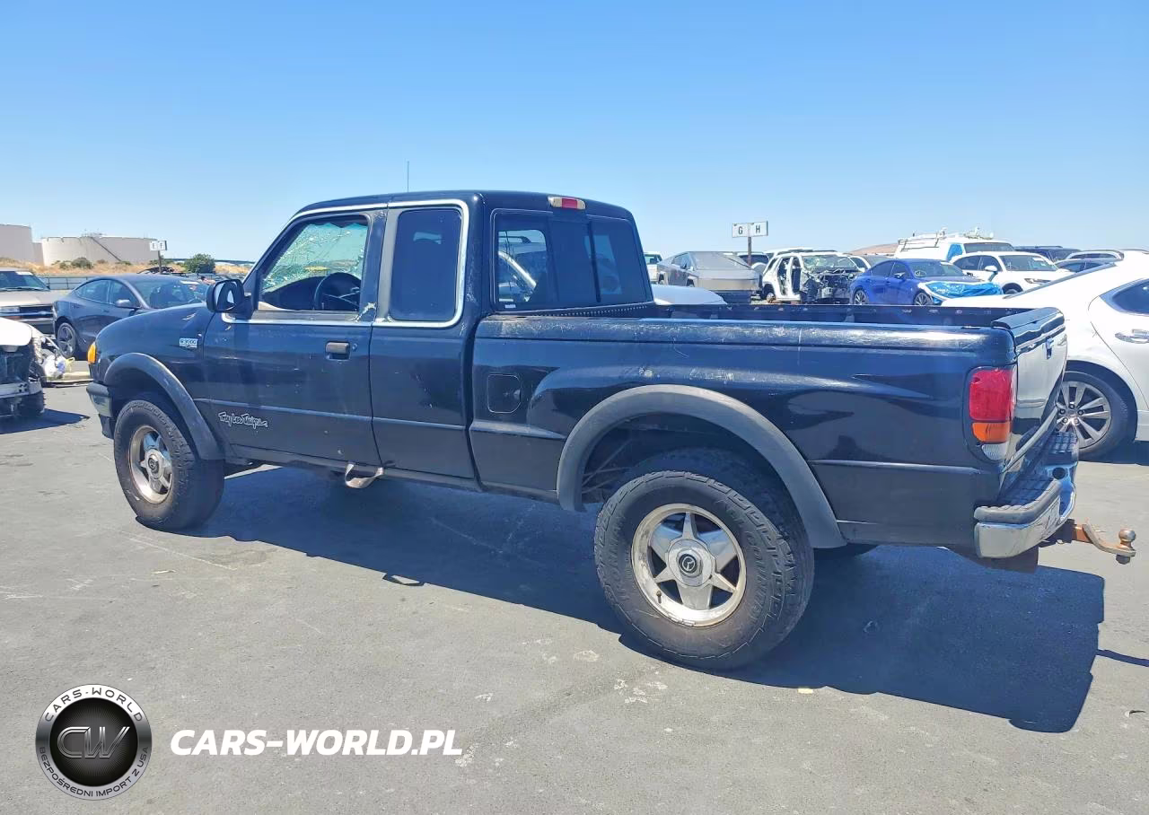 1999 Mazda B3000 Cab Plus VIN:4F4ZR16V3XTM32717 - 2