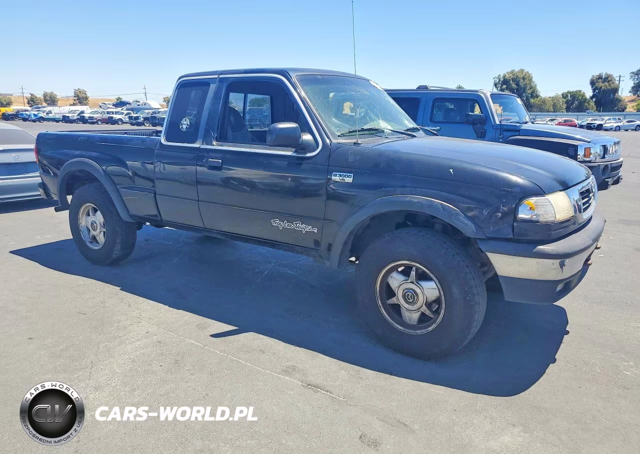 1999 Mazda B3000 Cab Plus VIN:4F4ZR16V3XTM32717 - 4