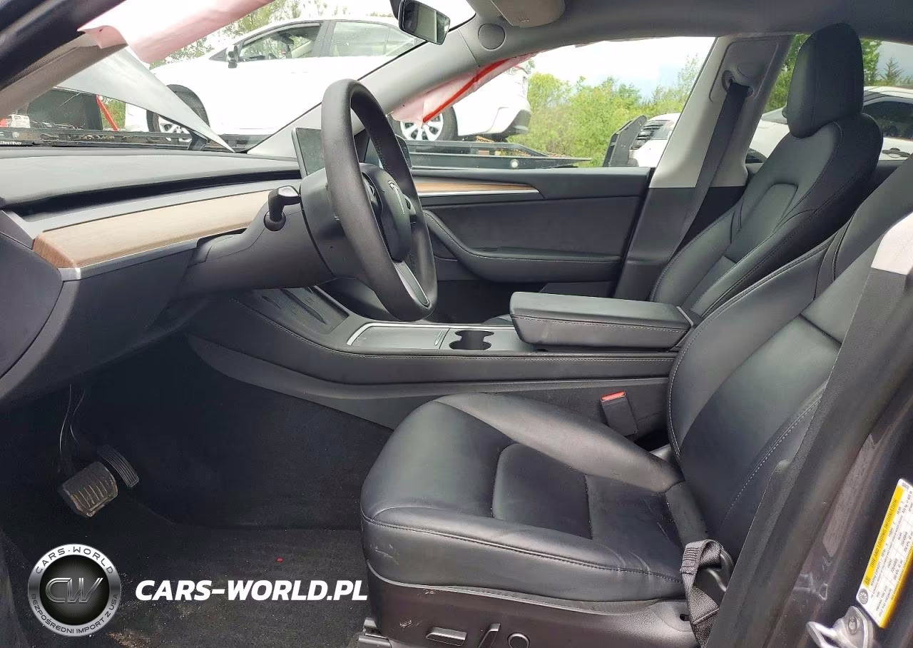 2023 Tesla Model Y VIN:7SAYGDEEXPF668476 - 7