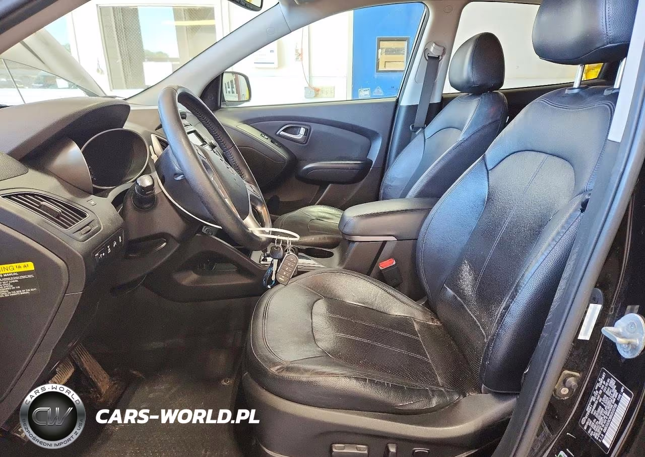 2011 Hyundai Tucson Limited VIN:KM8JUCAC9BU310738 - 7