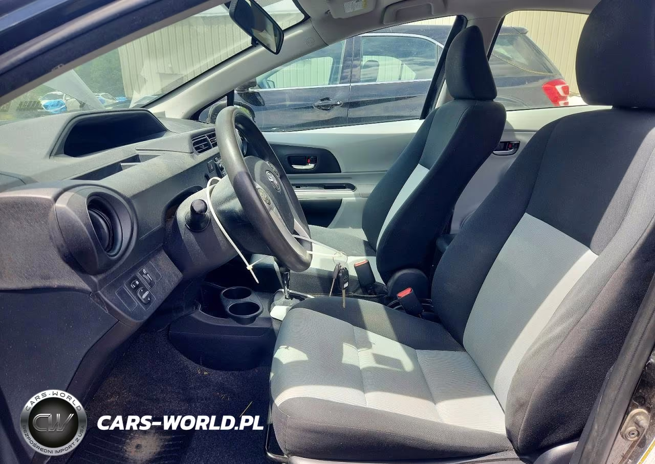 2014 Toyota Prius C Two VIN:JTDKDTB3XE1072623 - 7