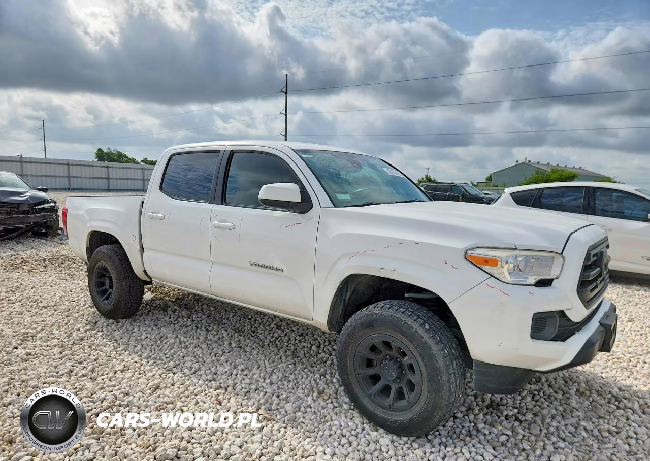2018 Toyota Tacoma Sr V6 VIN:3TMCZ5AN9JM149838 - 4