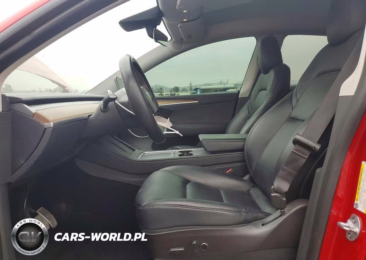 2022 Tesla Model Y VIN:7SAYGAEEXNF561813 - 7