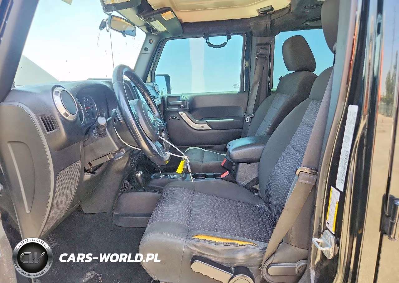 2012 Jeep Wrangler Unlimited Sahara VIN:1C4HJWEG6CL209643 - 7