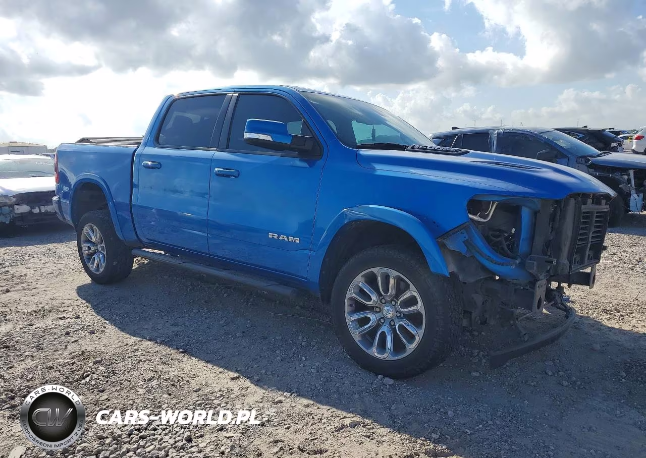 2020 Ram 1500 Laramie VIN:1C6SRFJT3LN323998 - 4