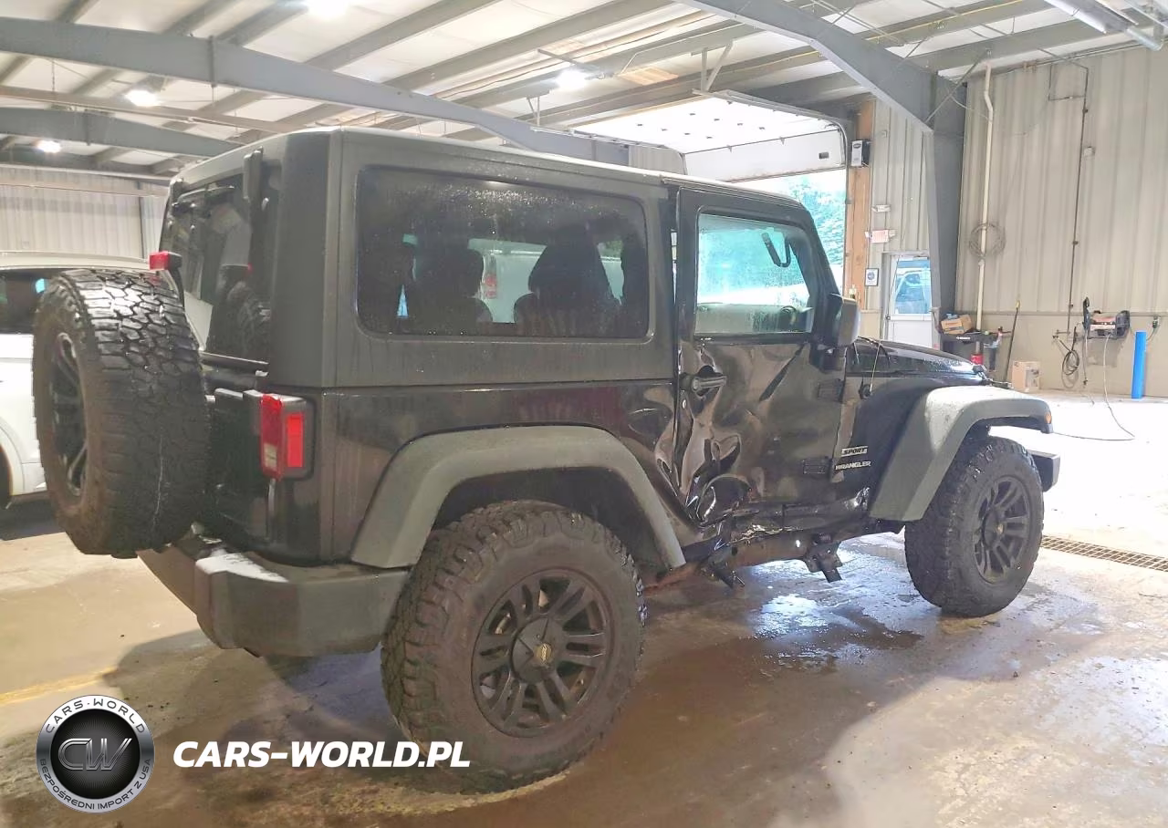 2011 Jeep Wrangler Sport VIN:1J4AA2D19BL596057 - 3