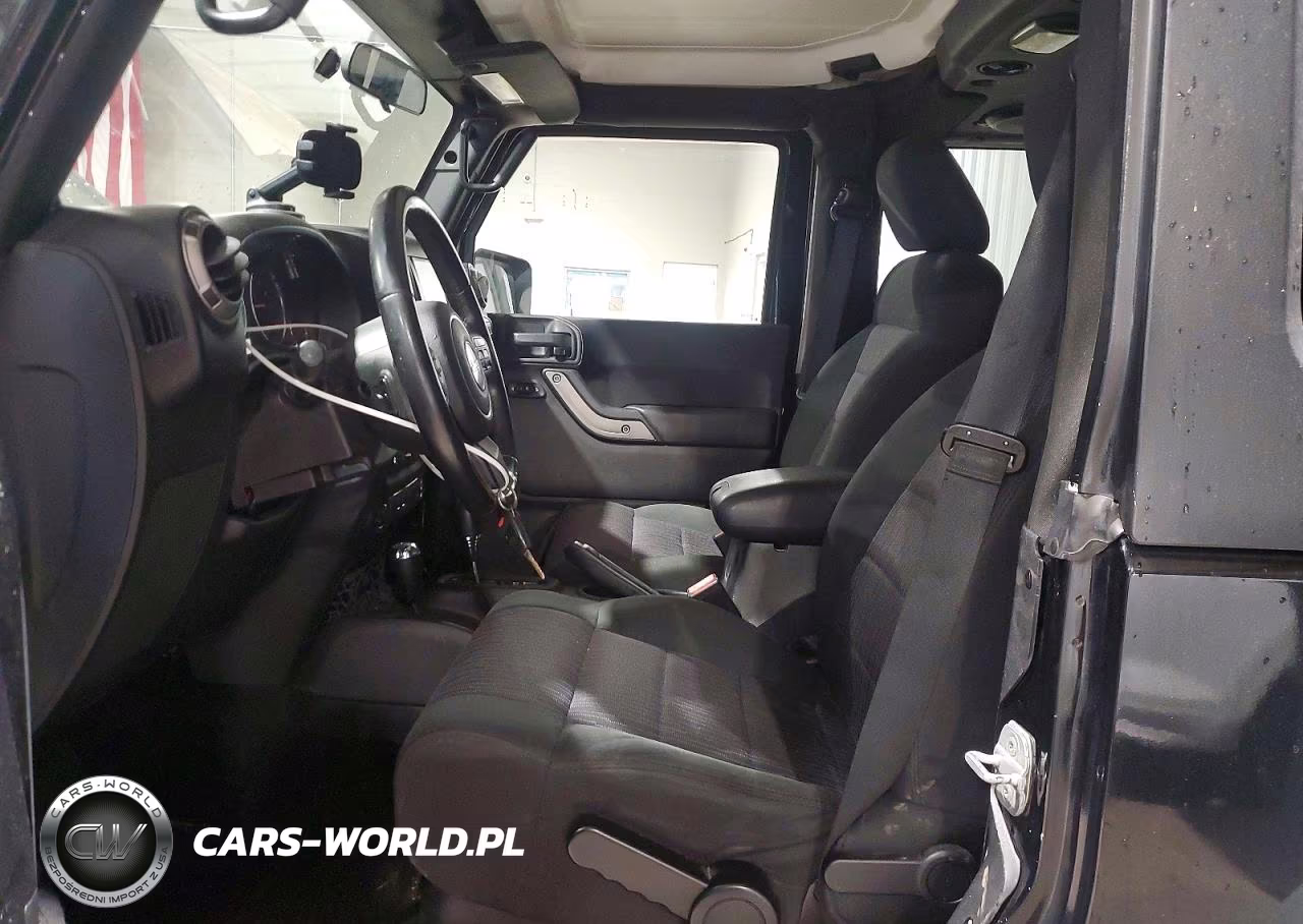 2011 Jeep Wrangler Sport VIN:1J4AA2D19BL596057 - 7