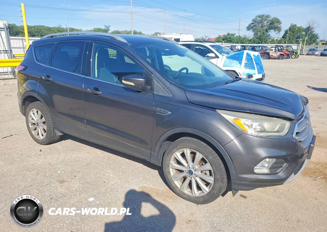 2017 Ford Escape Titanium VIN:1FMCU0J99HUD87050 - 4