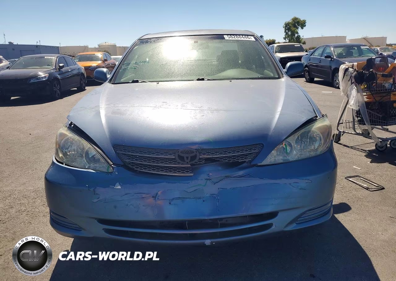 2002 Toyota Camry Le VIN:JTDBE32K020121995 - 5