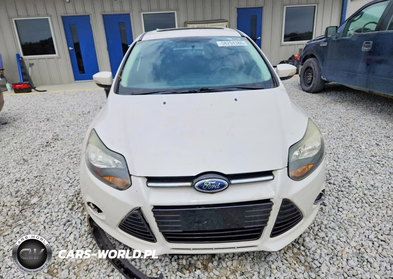 2014 Ford Focus Titanium VIN:1FADP3J25EL292027 - 5