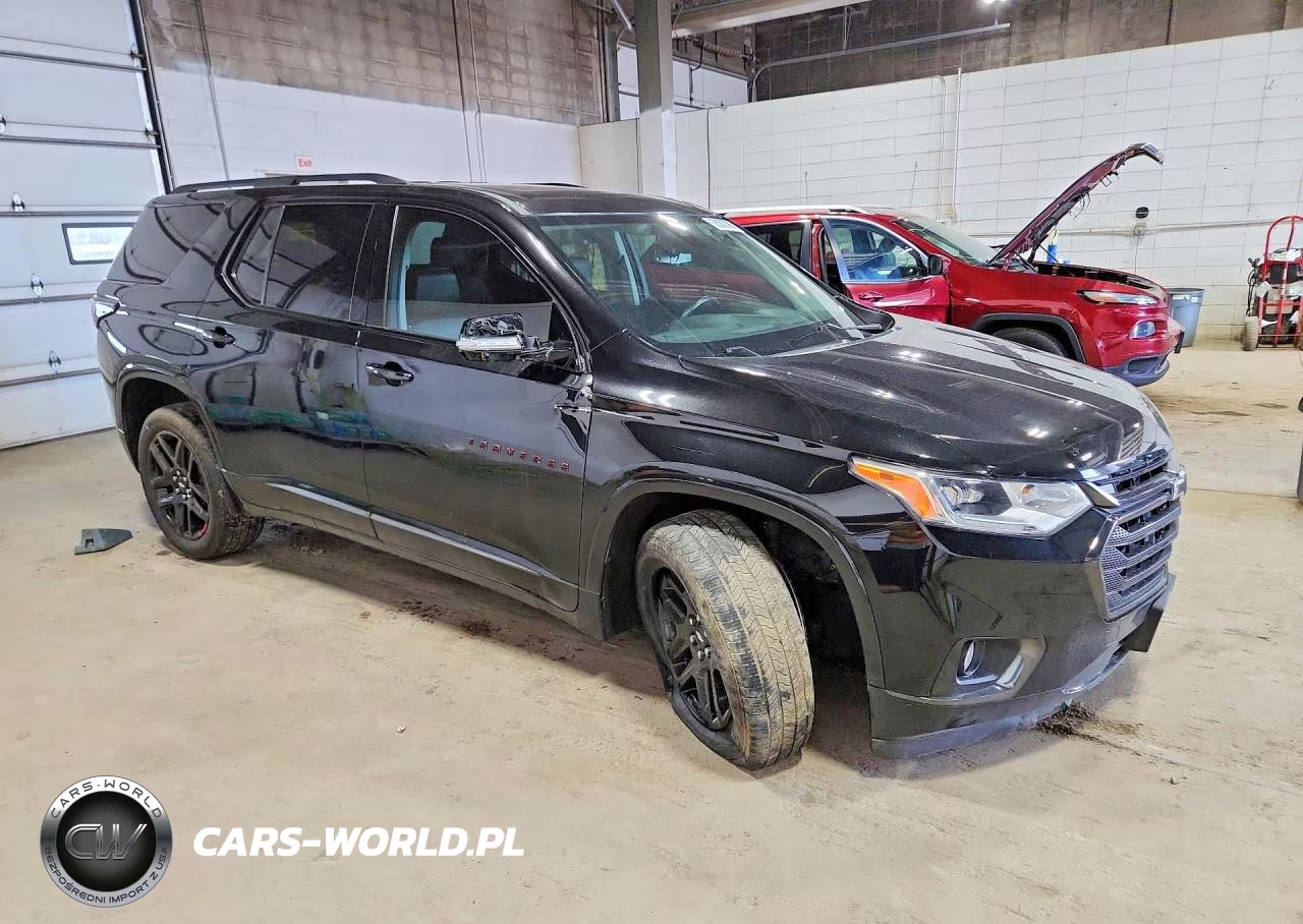 2018 Chevrolet Traverse Premier VIN:1GNEVJKW7JJ128933 - 4