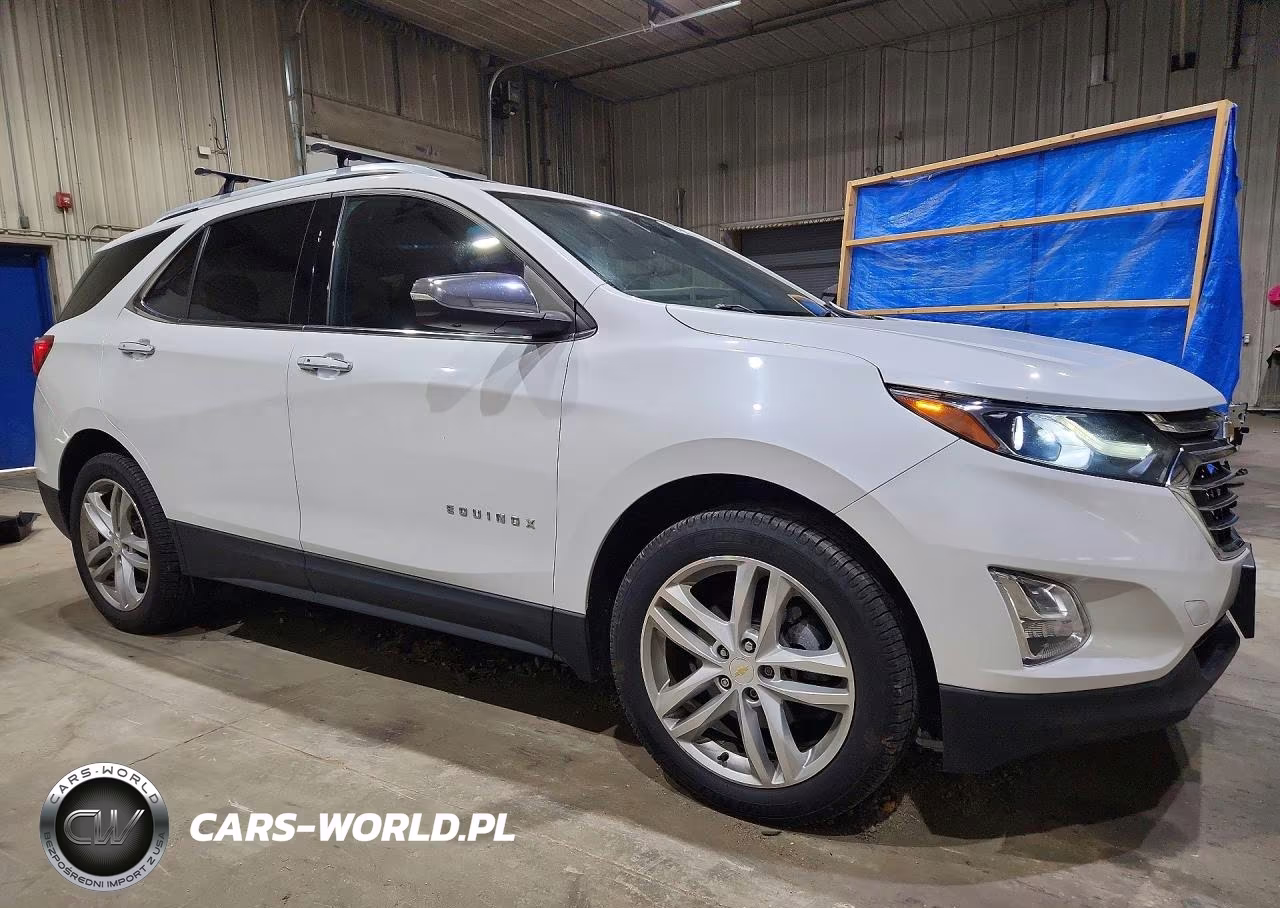 2018 Chevrolet Equinox Premier VIN:2GNAXWEX2J6345992 - 4