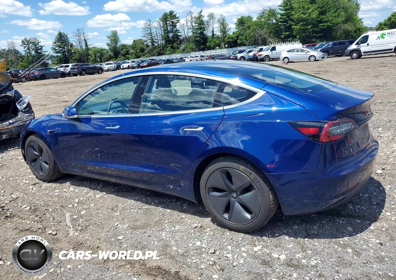 2018 Tesla Model 3 VIN:5YJ3E1EB7JF115373 - 2