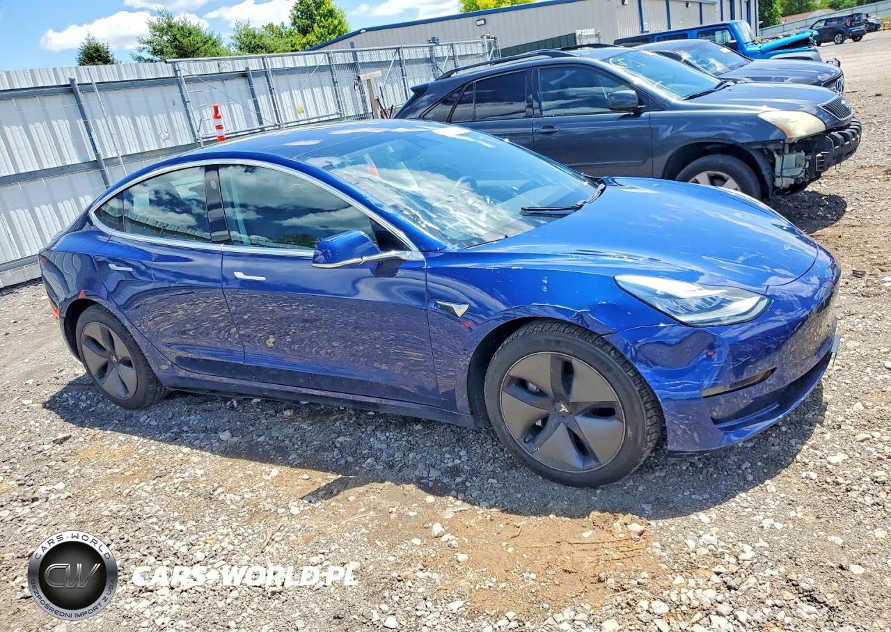 2018 Tesla Model 3 VIN:5YJ3E1EB7JF115373 - 4