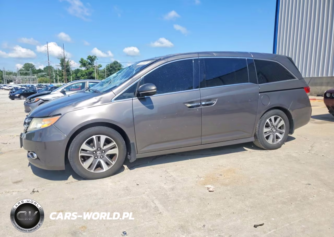 2015 Honda Odyssey Touring VIN:5FNRL5H97FB024787 - 1