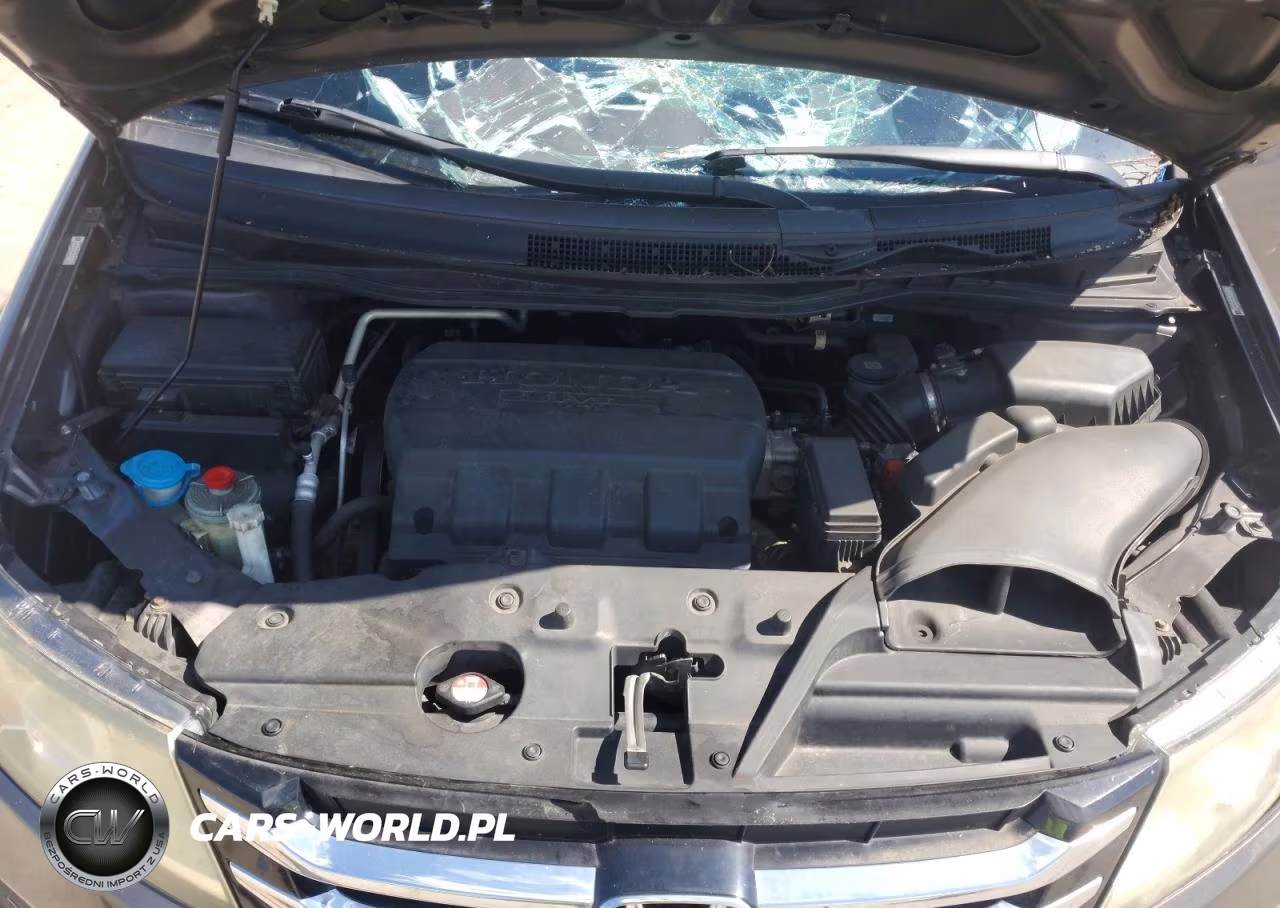 2015 Honda Odyssey Touring VIN:5FNRL5H97FB024787 - 12