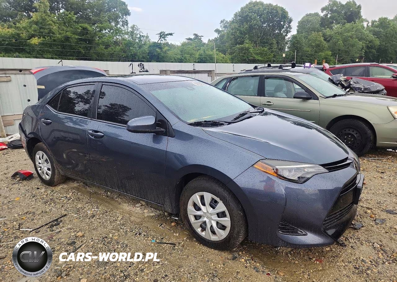 2018 Toyota Corolla L VIN:5YFBURHE6JP779512 - 4