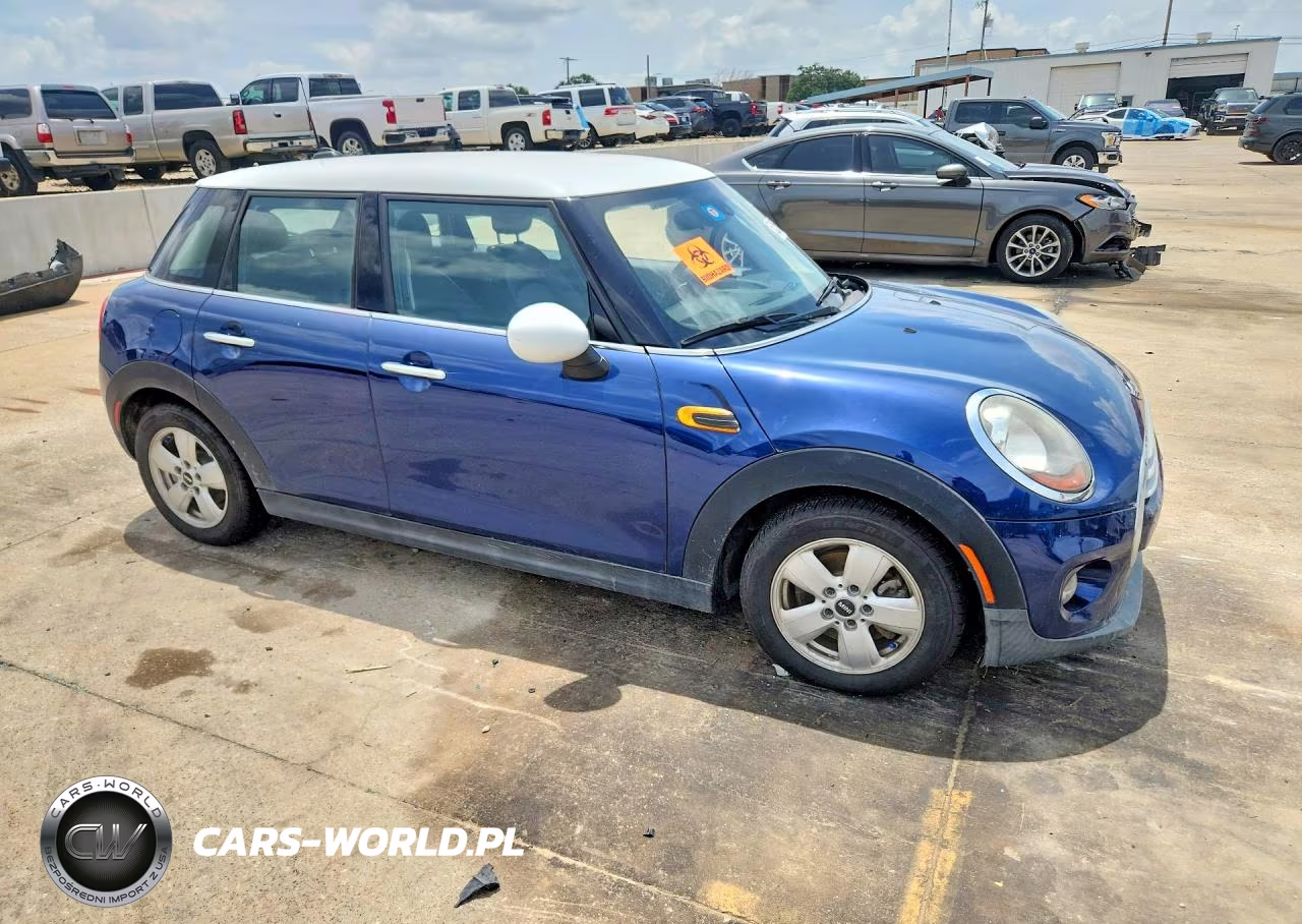 2015 Mini Cooper VIN:WMWXS5C50FT830950 - 4