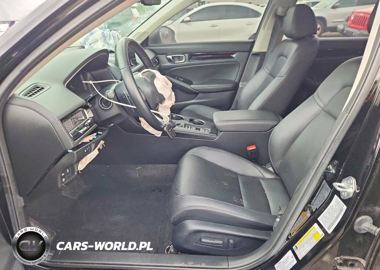 2023 Honda Civic Touring VIN:2HGFE1F90PH311703 - 7