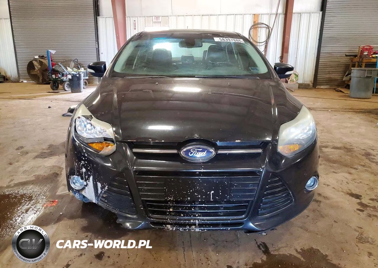 2012 Ford Focus Titanium VIN:1FAHP3J29CL408618 - 5