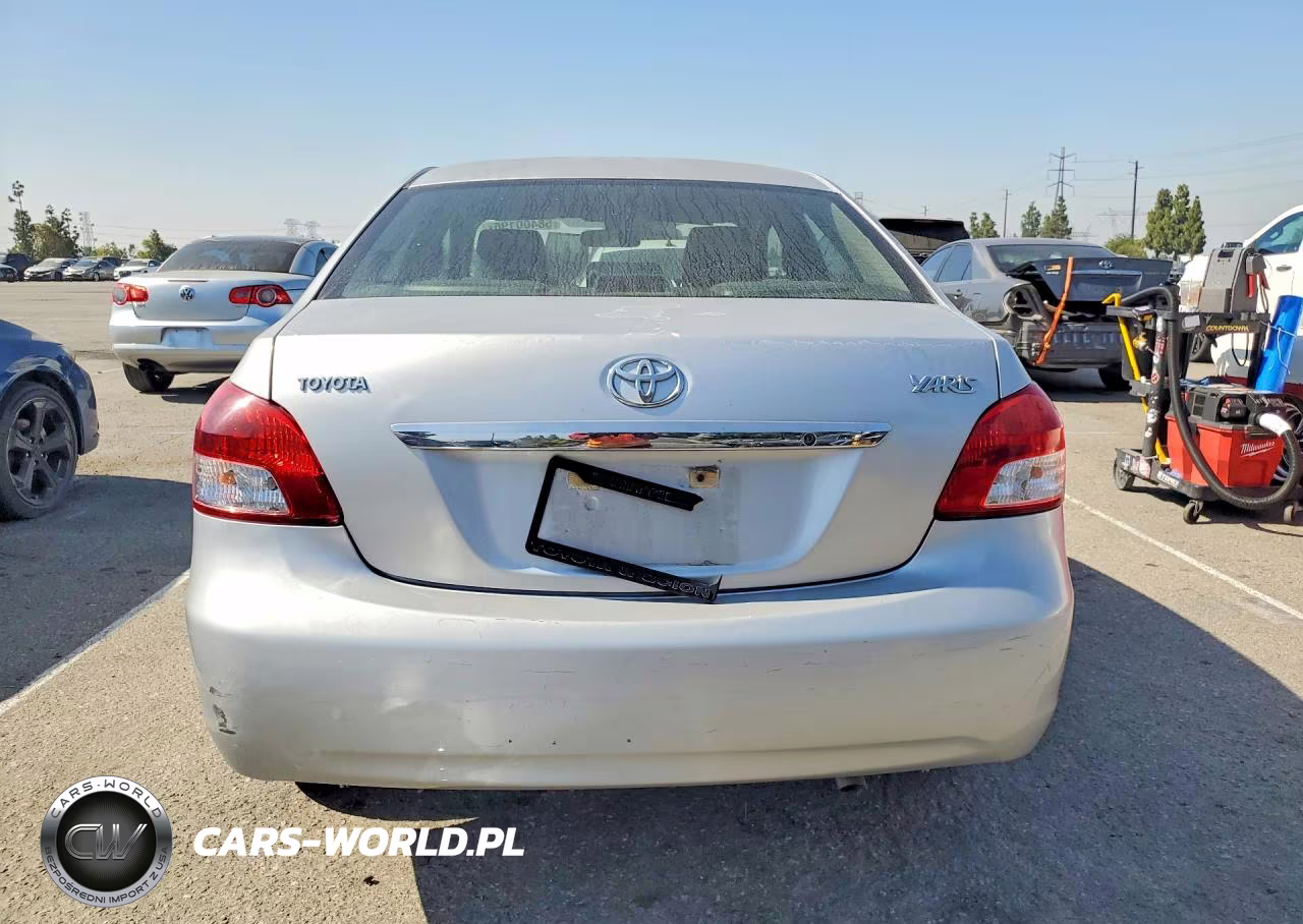 2009 Toyota Yaris Base VIN:JTDBT903191325357 - 6