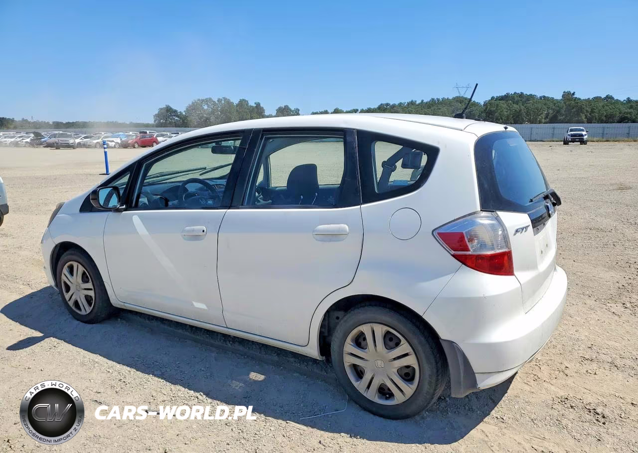 2009 Honda Fit VIN:JHMGE882X9S021913 - 2