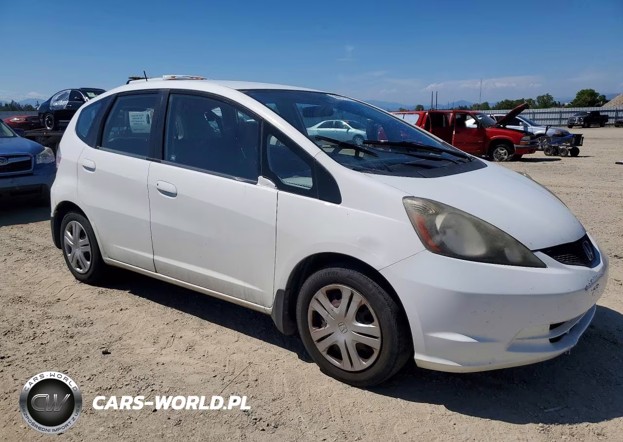 2009 Honda Fit VIN:JHMGE882X9S021913 - 4