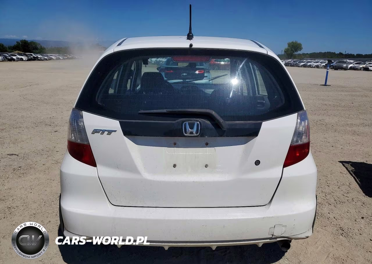 2009 Honda Fit VIN:JHMGE882X9S021913 - 6