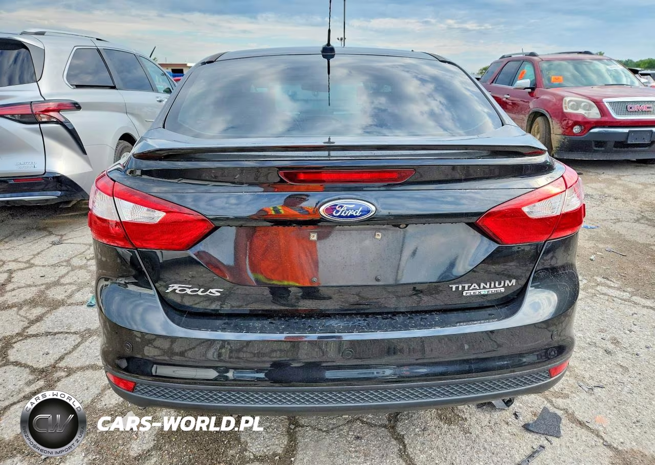 2014 Ford Focus Titanium VIN:1FADP3J2XEL107177 - 6