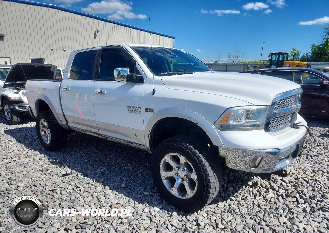 2015 Ram 1500 Laramie VIN:1C6RR7NT5FS767050 - 4