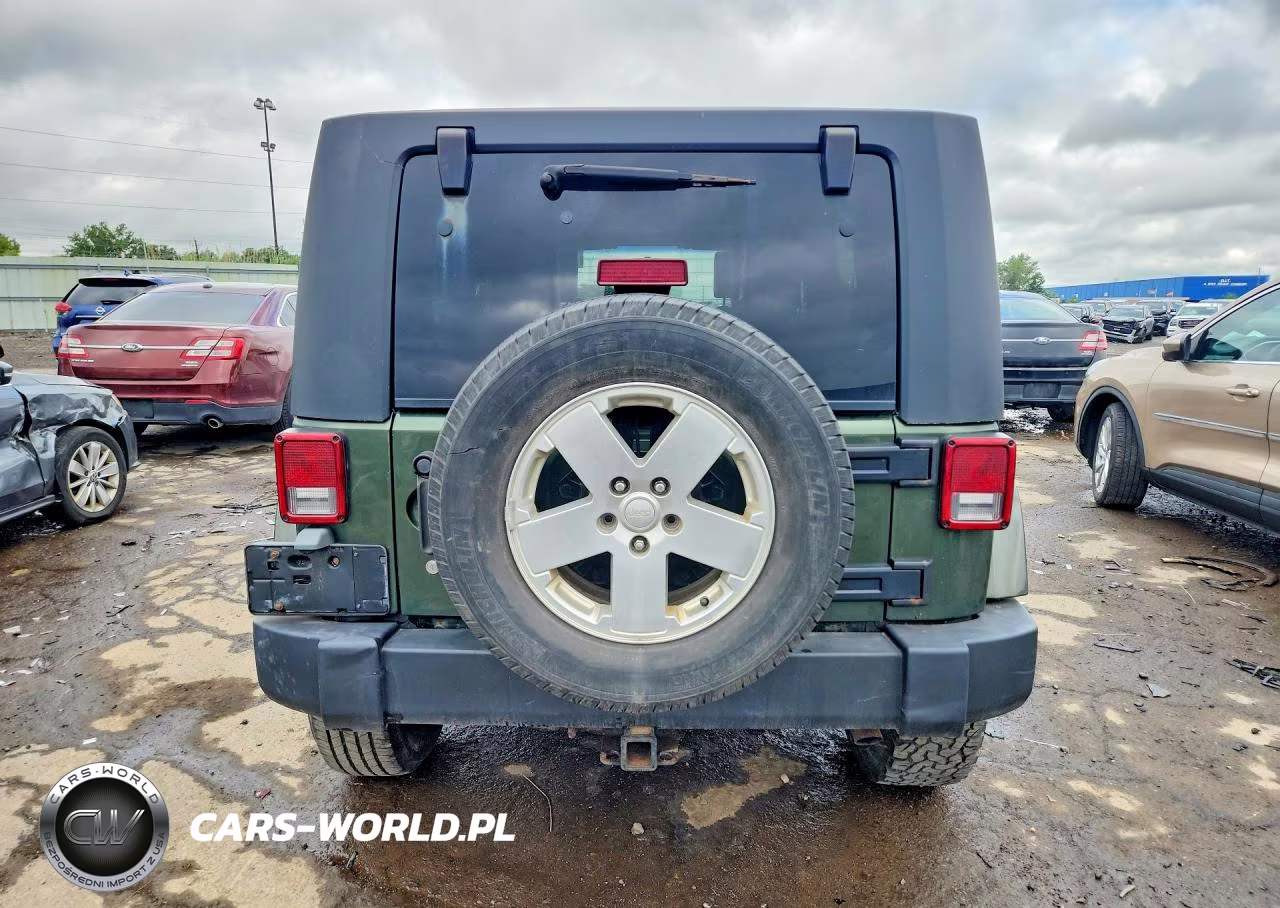 2007 Jeep Wrangler Sahara VIN:1J4GA59157L127706 - 6