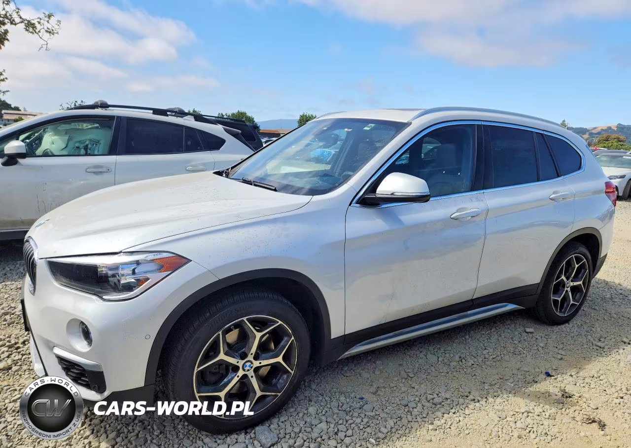 2018 BMW X1 xDrive28I VIN:WBXHT3C39J5L28204 - 1
