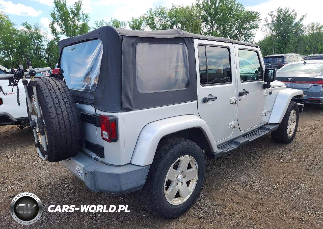 2009 Jeep Wrangler Unlimited Sahara VIN:1J8GA59109L788223 - 3