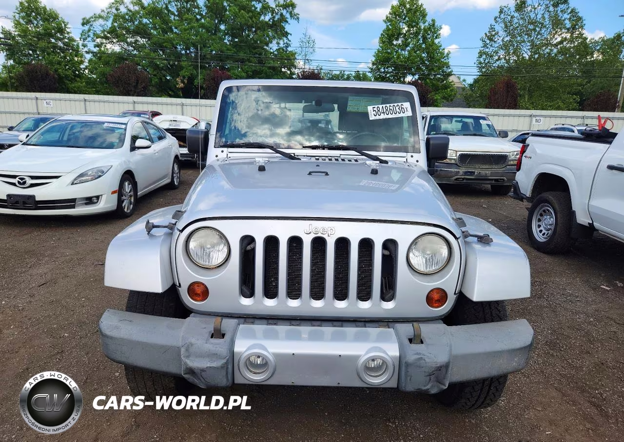 2009 Jeep Wrangler Unlimited Sahara VIN:1J8GA59109L788223 - 5