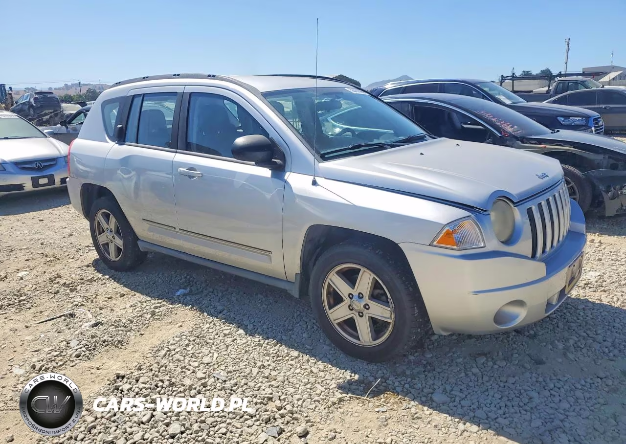 2010 Jeep Compass Sport VIN:1J4NT4FBXAD558391 - 4