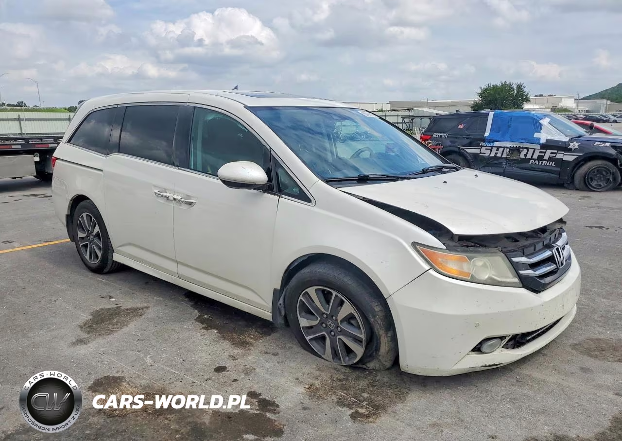 2016 Honda Odyssey Touring VIN:5FNRL5H99GB053242 - 4