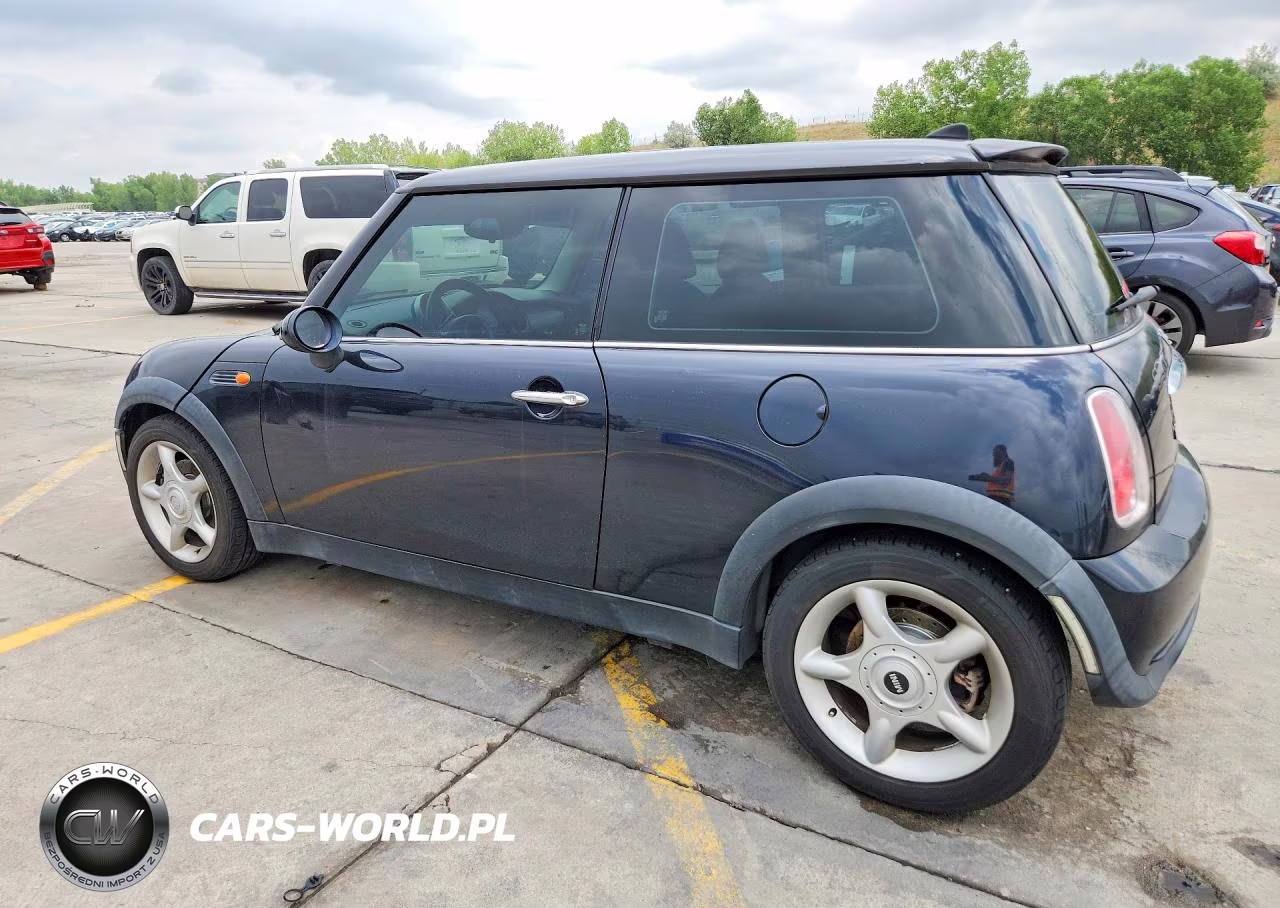 2006 Mini Cooper VIN:WMWRC33516TK64999 - 2