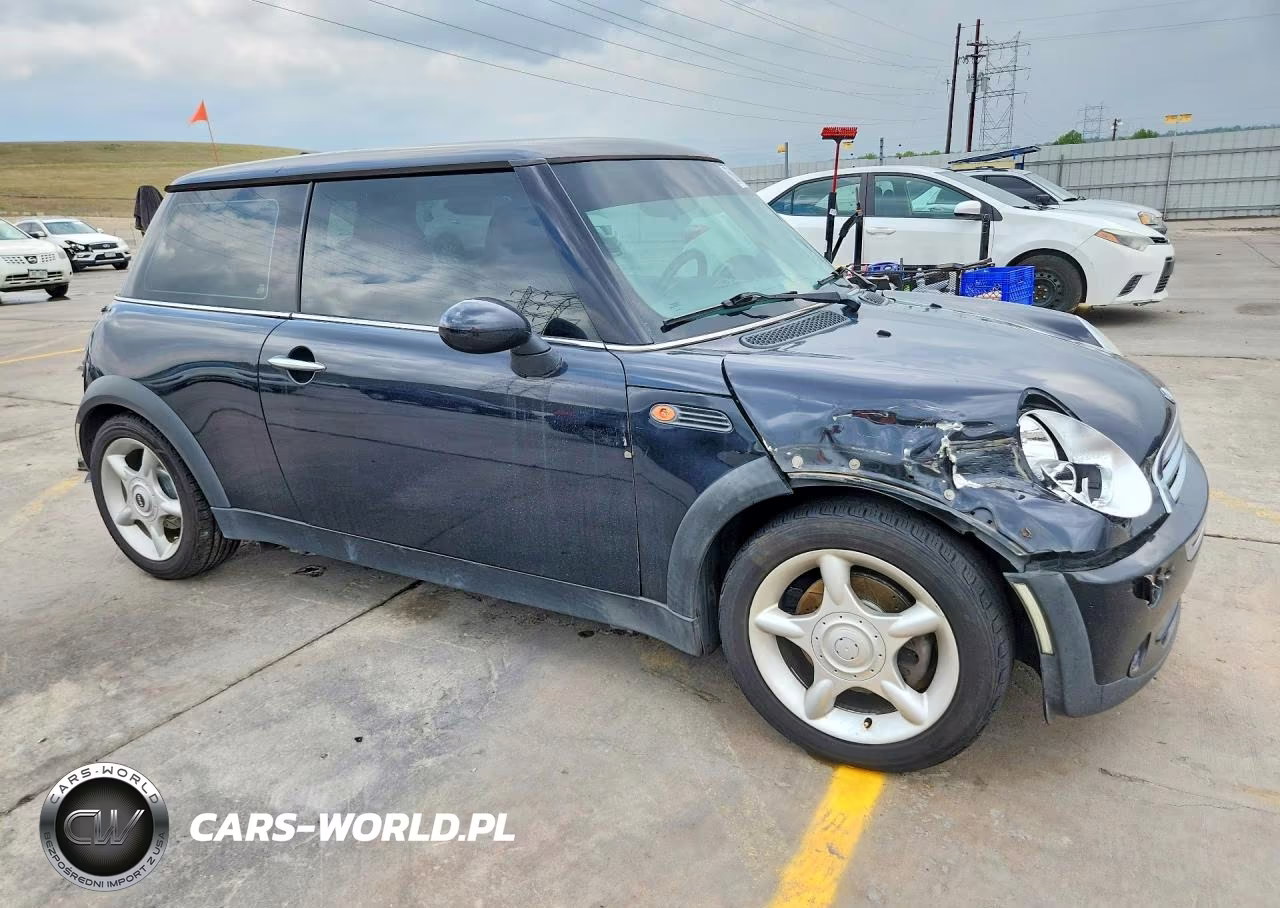 2006 Mini Cooper VIN:WMWRC33516TK64999 - 4