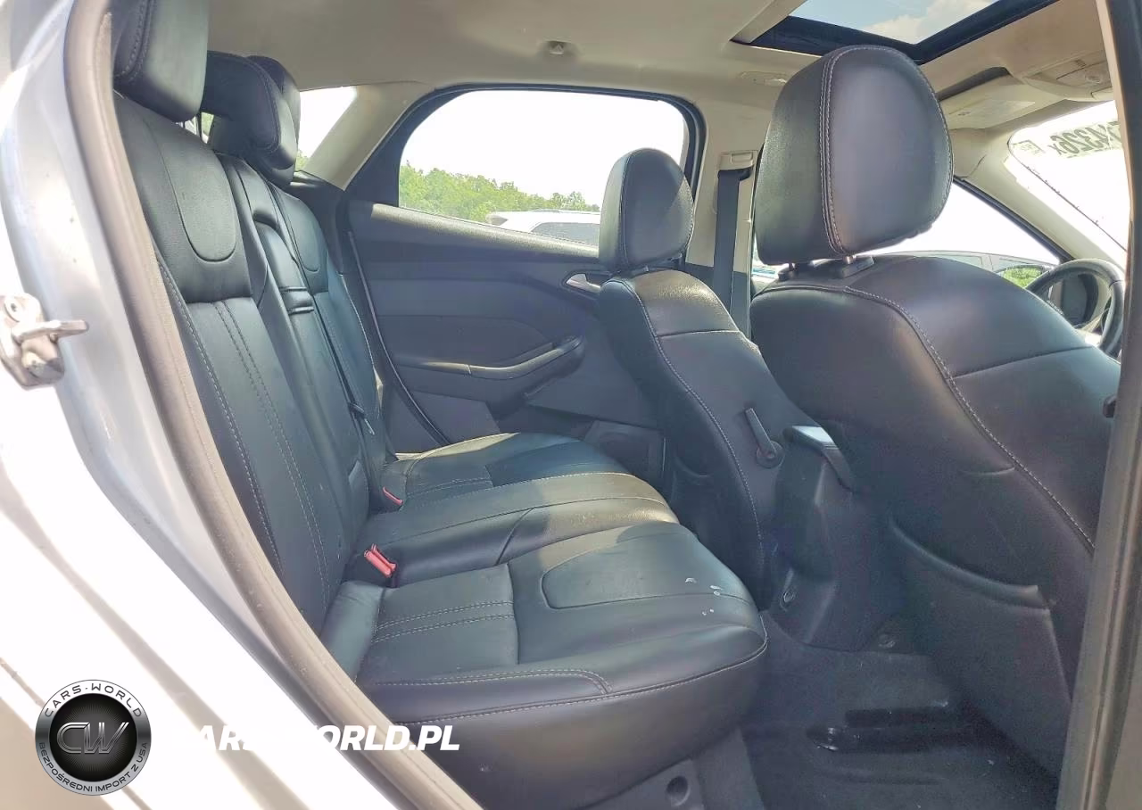 2013 Ford Focus Titanium VIN:1FADP3N28DL203043 - 10