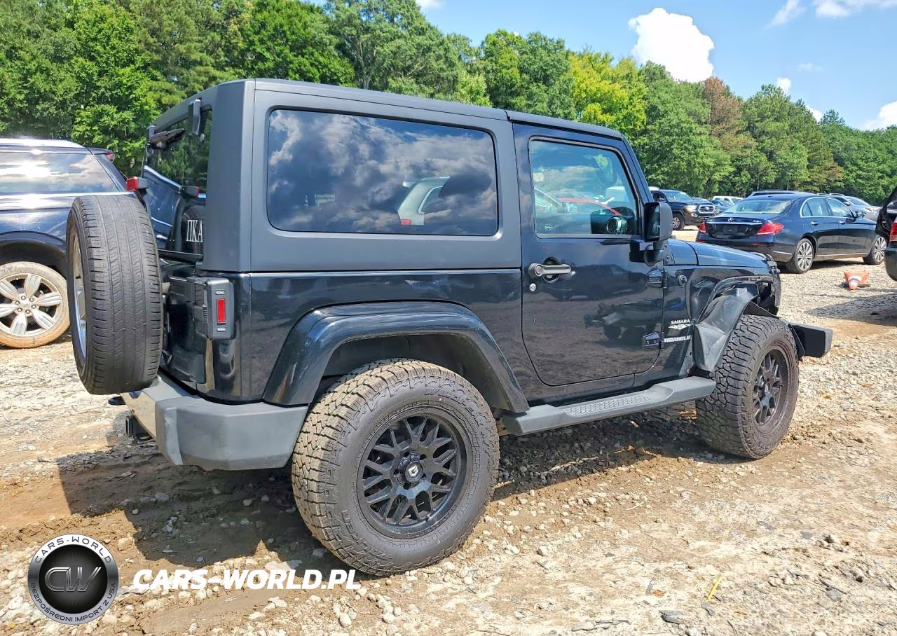 2011 Jeep Wrangler Sahara VIN:1J4AA5D14BL539573 - 3