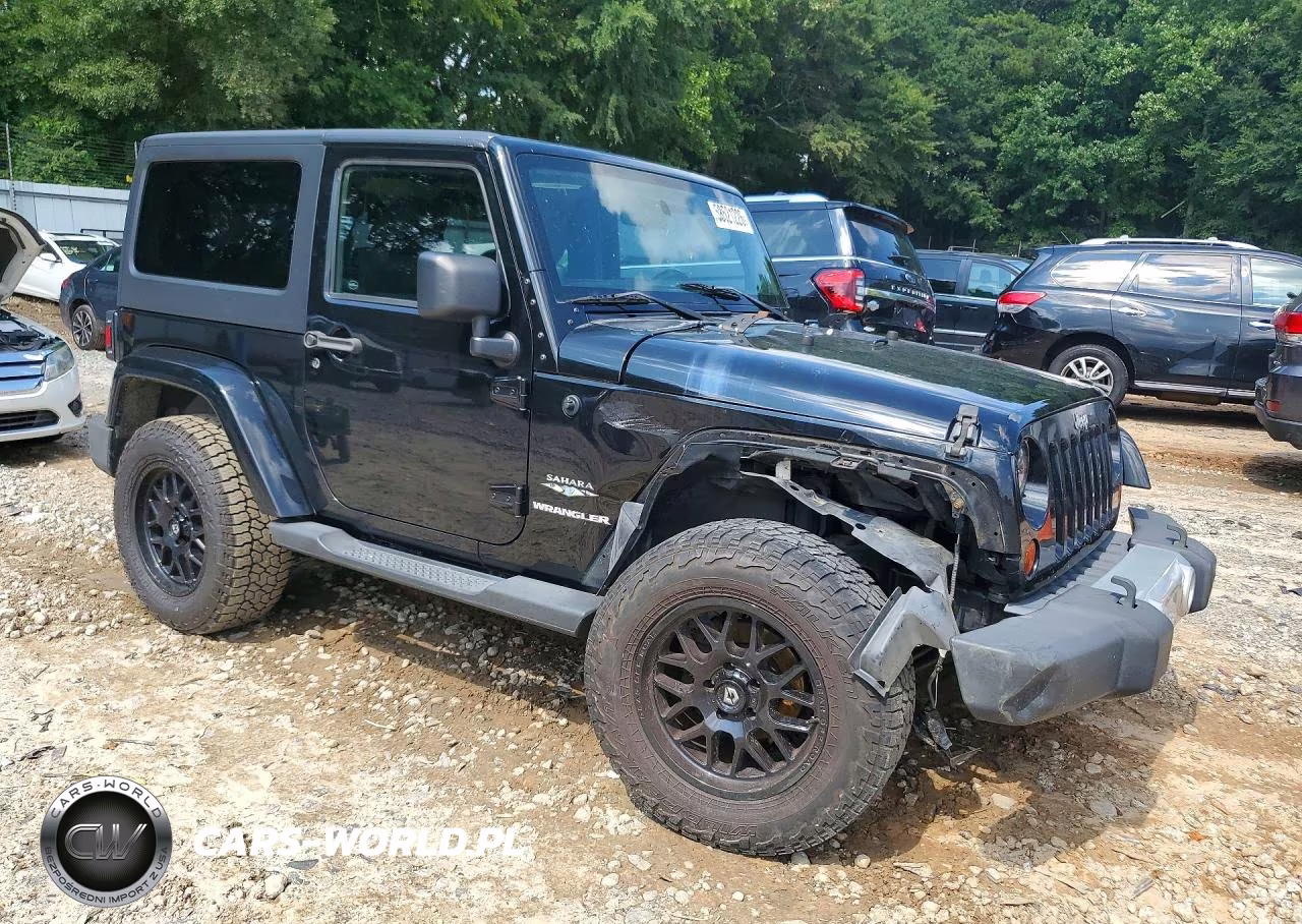 2011 Jeep Wrangler Sahara VIN:1J4AA5D14BL539573 - 4