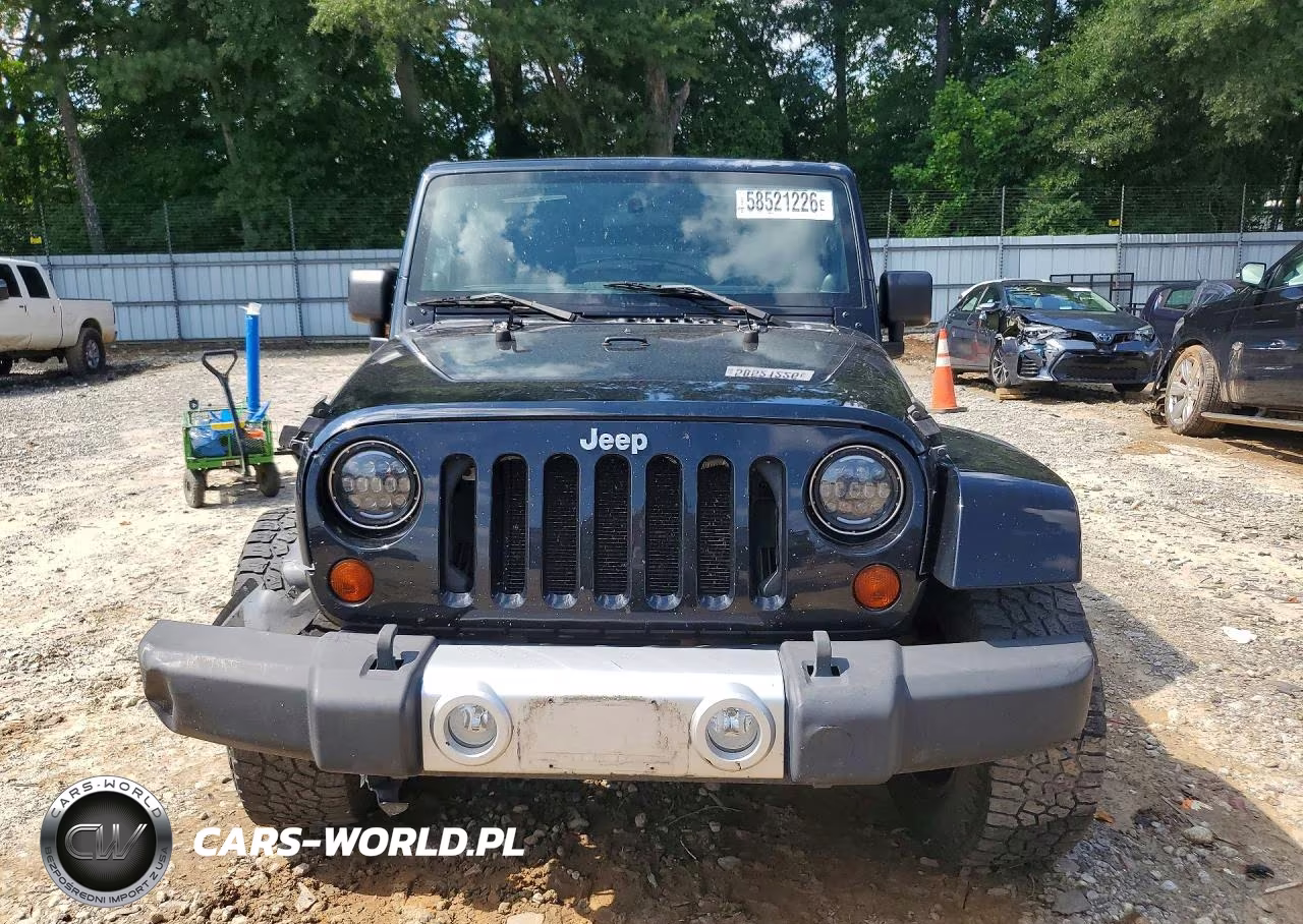 2011 Jeep Wrangler Sahara VIN:1J4AA5D14BL539573 - 5