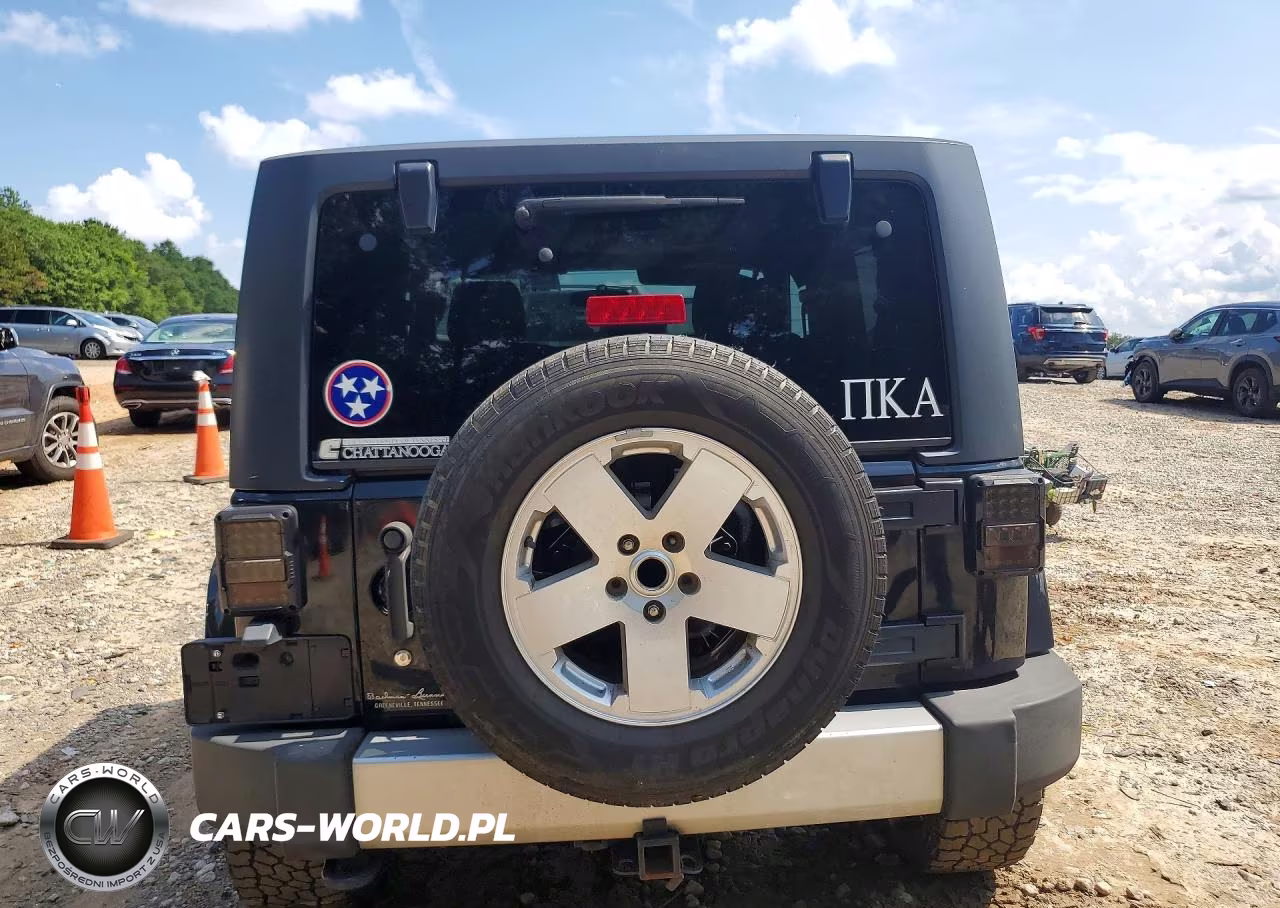 2011 Jeep Wrangler Sahara VIN:1J4AA5D14BL539573 - 6