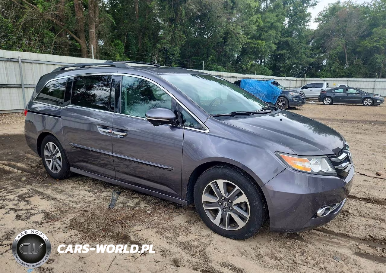 2015 Honda Odyssey Touring VIN:5FNRL5H91FB085410 - 4