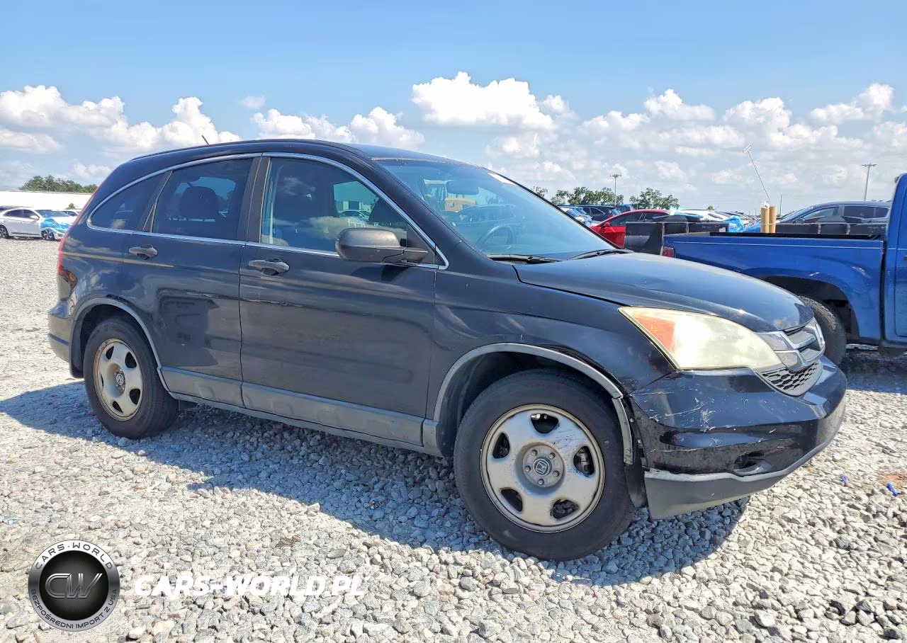 2011 Honda Cr-V Lx VIN:5J6RE3H37BL021061 - 4