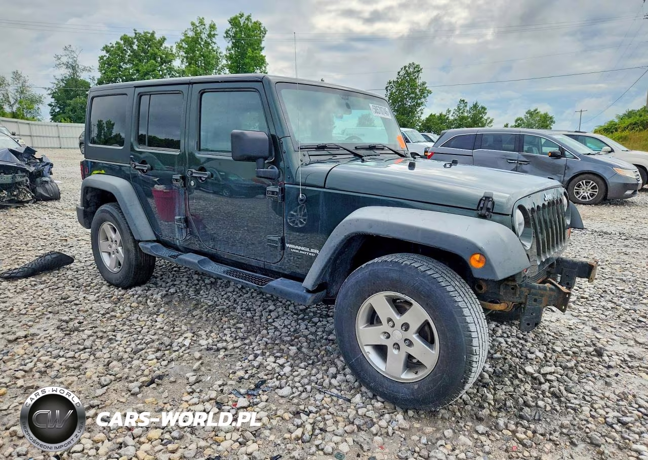 2011 Jeep Wrangler Unlimited Rubicon VIN:1J4HA6H15BL583001 - 4