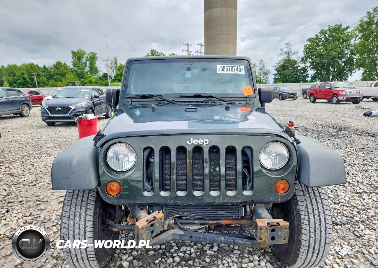 2011 Jeep Wrangler Unlimited Rubicon VIN:1J4HA6H15BL583001 - 5