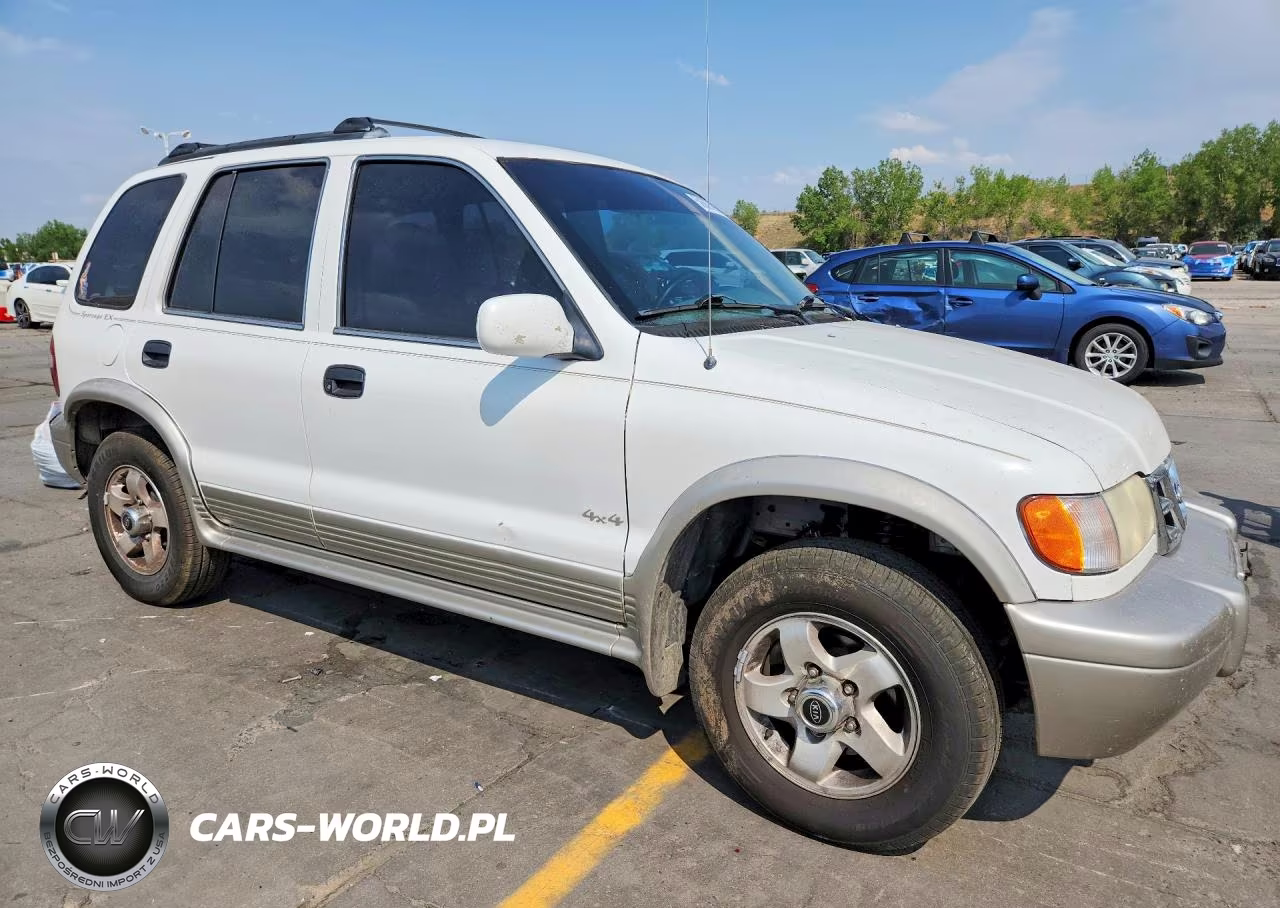 2000 Kia Sportage Base VIN:KNDJA7238Y5644006 - 4