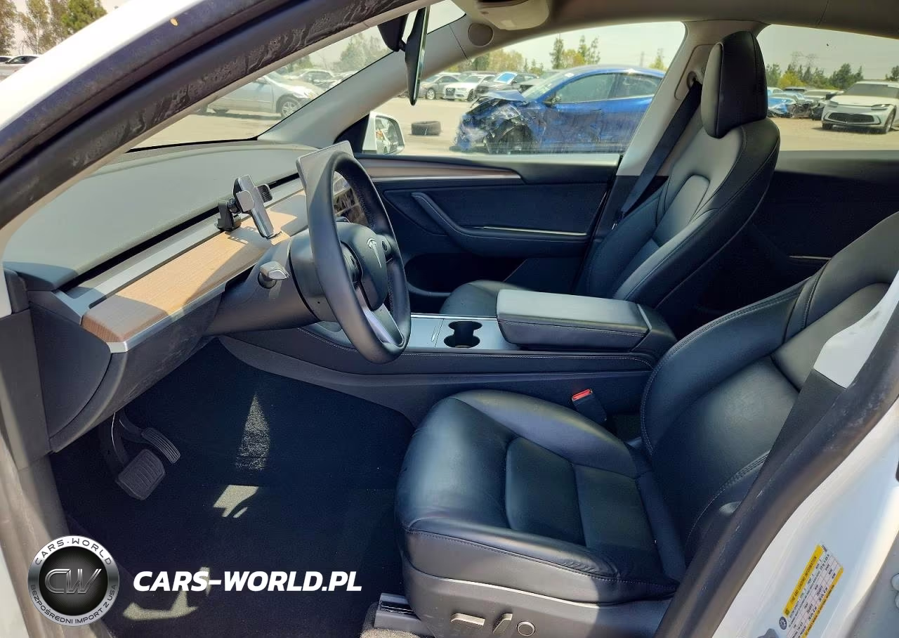 2025 Tesla Model Y VIN:7SAYGDED6SF272660 - 7
